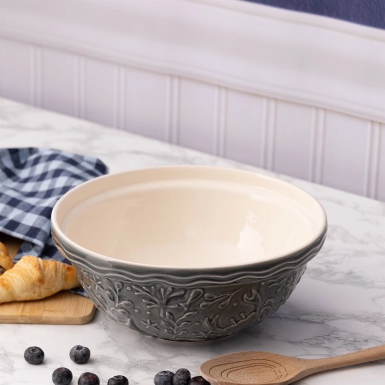 Charakterystyczny motyw  NAUTICAL GREY CRAB w odcieniu zieleni nadaje jej elegancki, rustykalny styl, który pięknie prezentuje się na blacie kuchennym.